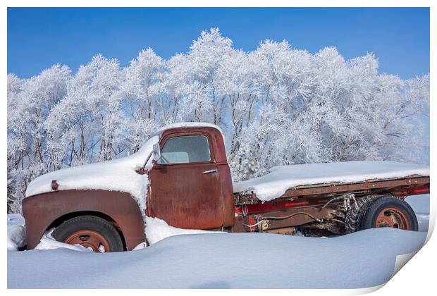 old truck in the snow Print by Dave Reede