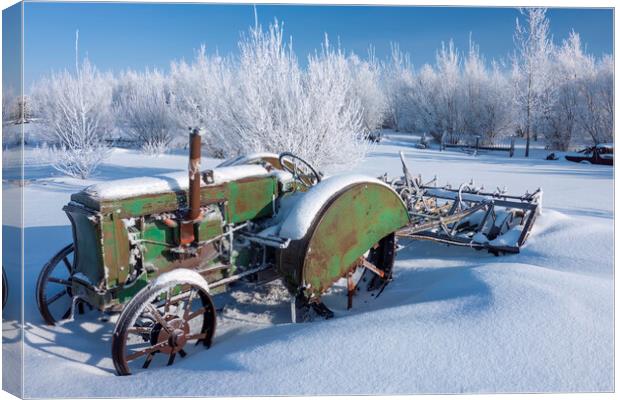 old tractor, hoarfrost on trees Canvas Print by Dave Reede