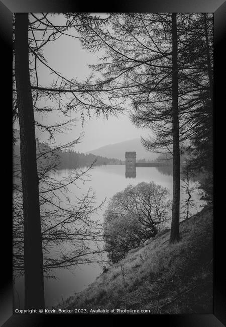 Moody mirror dam viewpoint through the trees Framed Print by Kevin Booker