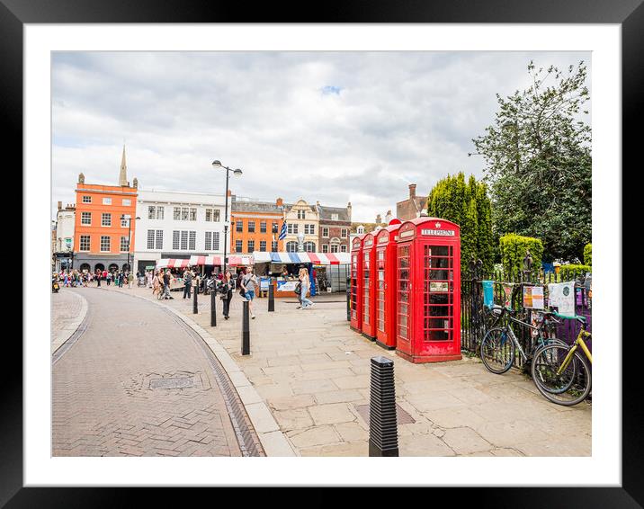 Red phone boxes next to Cambridge market Framed Mounted Print by Jason Wells