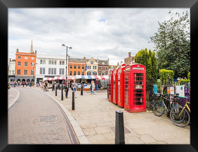 Red phone boxes next to Cambridge market Framed Print by Jason Wells