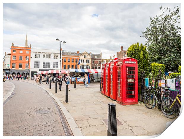Red phone boxes next to Cambridge market Print by Jason Wells