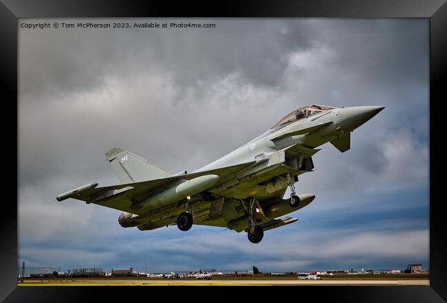 Typhoon FGR.Mk 4A fighter jet flying through the air on a cloudy day Framed Print by Tom McPherson