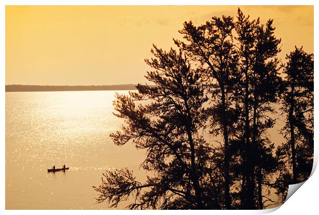 canoeing across Big Whiteshell Lake Print by Dave Reede