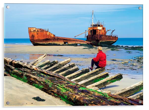 woman sitting on remains of wooden shipwreck viewing shipwreck Acrylic by Dave Reede