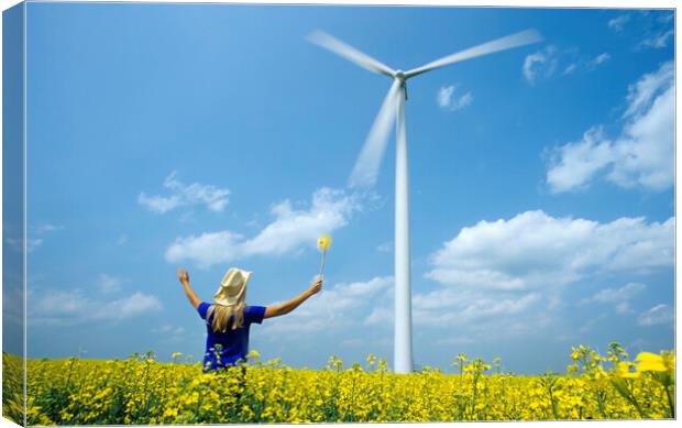 girl with pinwheel viewing wind turbine Canvas Print by Dave Reede