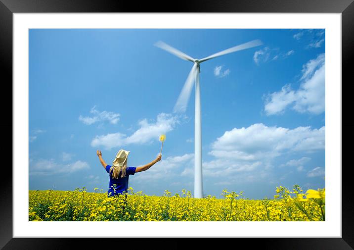 girl with pinwheel viewing wind turbine Framed Mounted Print by Dave Reede