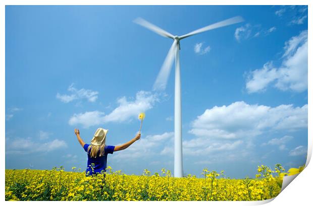girl with pinwheel viewing wind turbine Print by Dave Reede