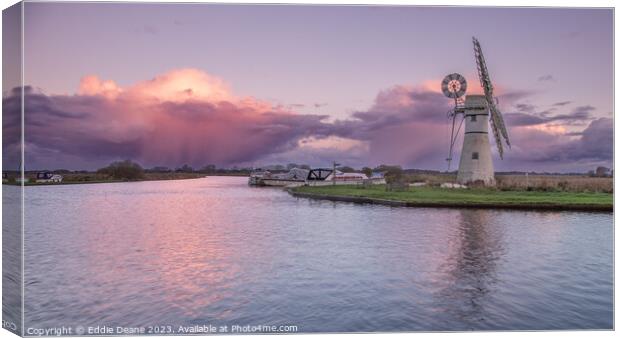 Thurne Windmill and storm clouds  Canvas Print by Eddie Deane