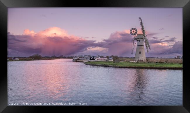 Thurne Windmill and storm clouds  Framed Print by Eddie Deane