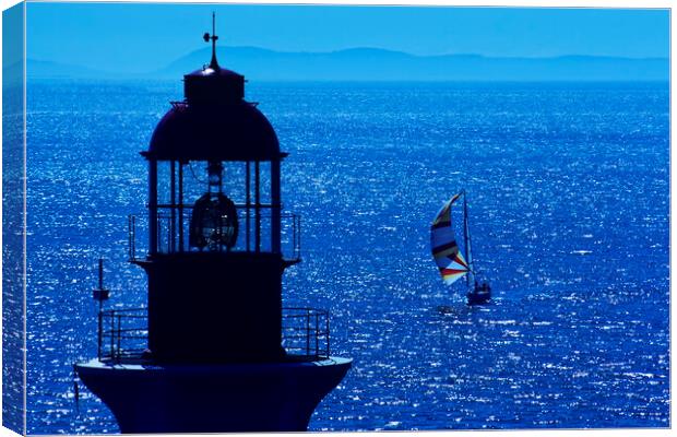 lighthouse and sailboat Canvas Print by Dave Reede