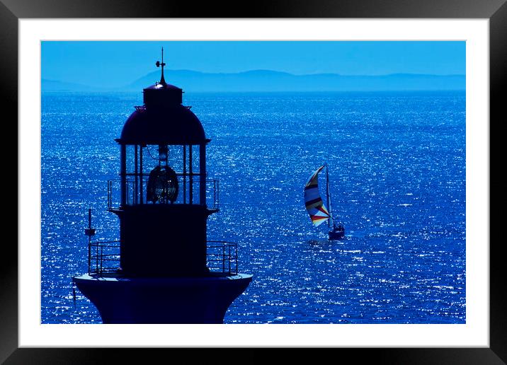 lighthouse and sailboat Framed Mounted Print by Dave Reede