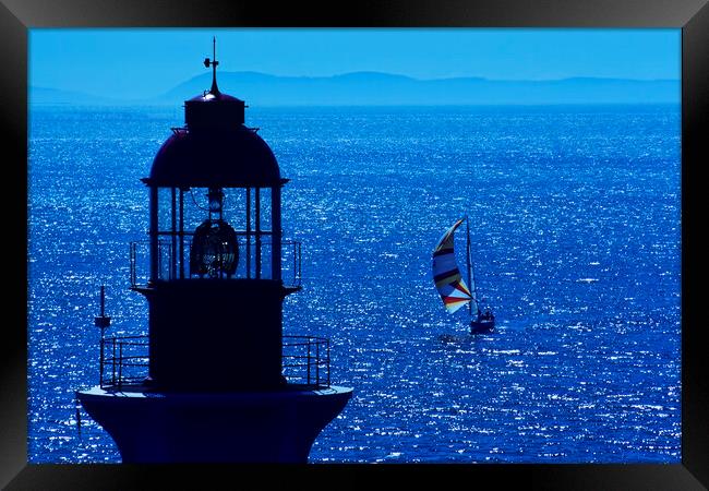 lighthouse and sailboat Framed Print by Dave Reede