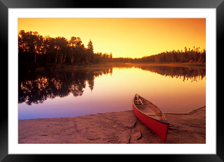 canoe along the Whiteshell River Framed Mounted Print by Dave Reede