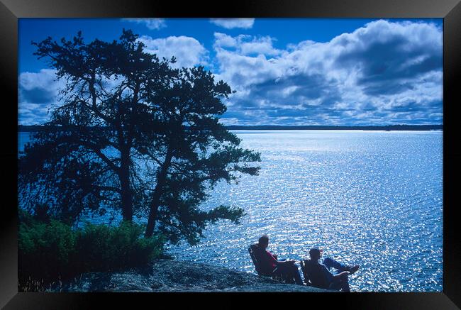 Relaxing at the Lake Framed Print by Dave Reede