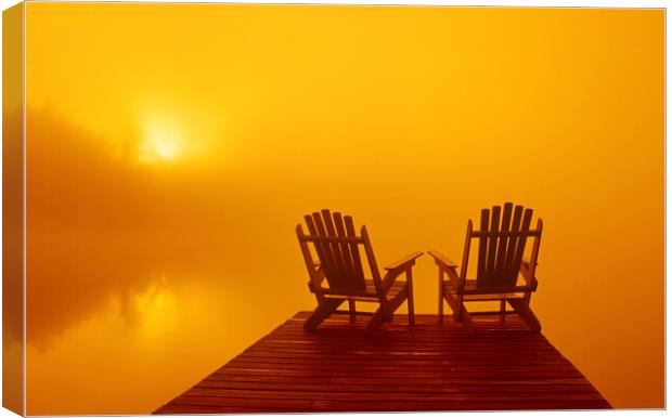 Chairs in the Early Morning Fog Canvas Print by Dave Reede