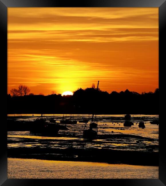 Silhouettes sunrise over the Brightlingsea Harbour  Framed Print by Tony lopez