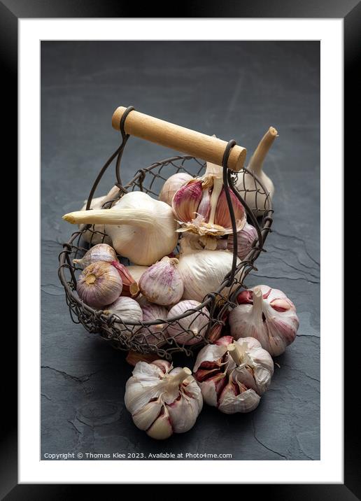Still life, Garlic in a basket on a slate plate Framed Mounted Print by Thomas Klee