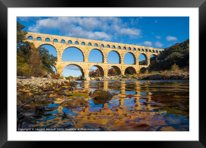 The Pont du Gard viewed from the river. Ancient Roman aqueduct b Framed Mounted Print by Laurent Renault