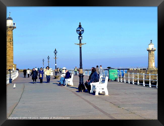 Whitby Pier, North Yorkshire. Framed Print by john hill