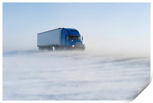 truck on road covered with blowing snow Print by Dave Reede