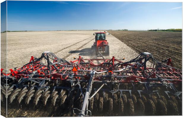 moving tractor and and air till seeder planting soybeans Canvas Print by Dave Reede