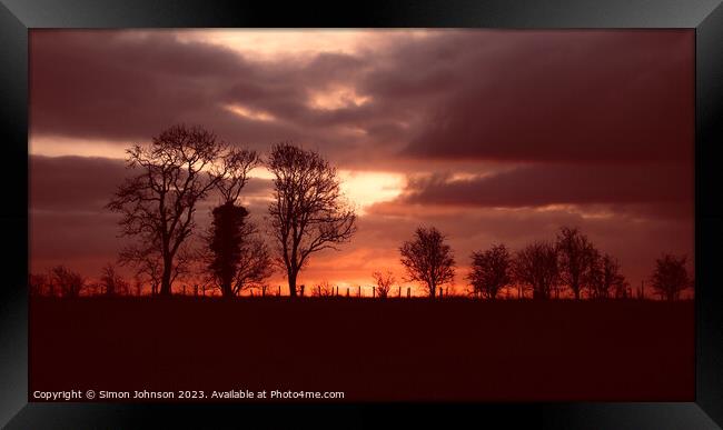 Tree silhouette at sunrise Framed Print by Simon Johnson