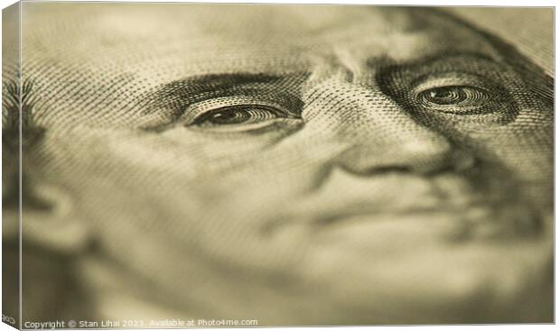 Benjamin Franklin's eyes on the 100 dollar bill Canvas Print by Stan Lihai