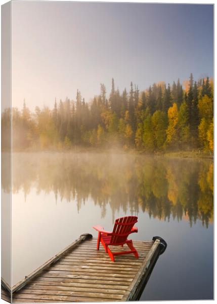 Muskoka chair on dock Canvas Print by Dave Reede