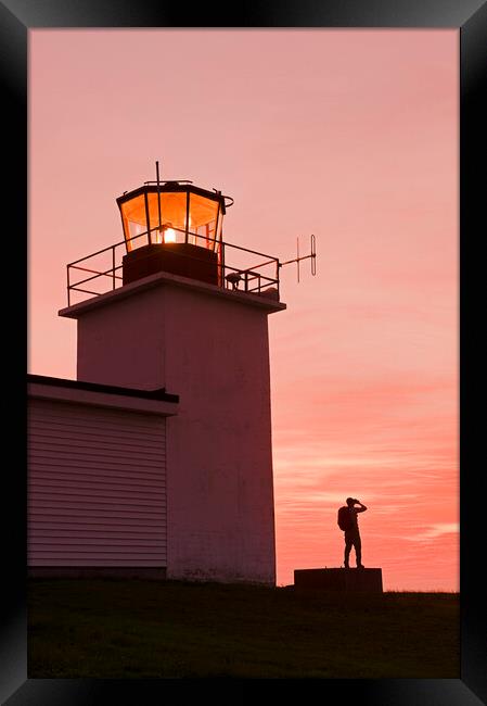 hiker looking out from Grand Passage lighthouse Framed Print by Dave Reede