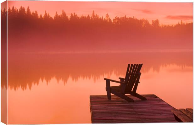 chair on dock at Glad Lake Canvas Print by Dave Reede