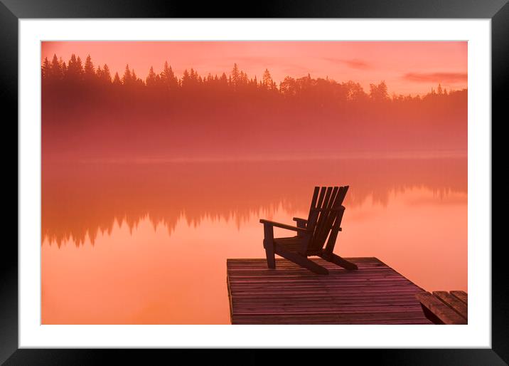 chair on dock at Glad Lake Framed Mounted Print by Dave Reede