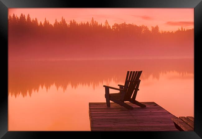 chair on dock at Glad Lake Framed Print by Dave Reede