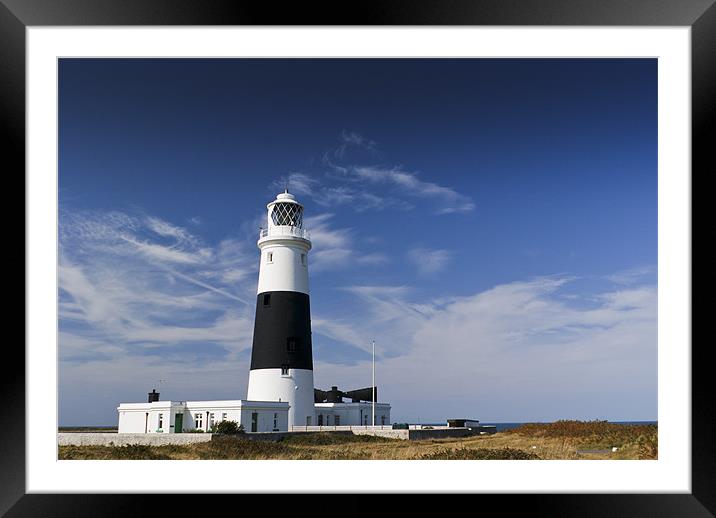 Alderney lighthouse Framed Mounted Print by Gary Eason