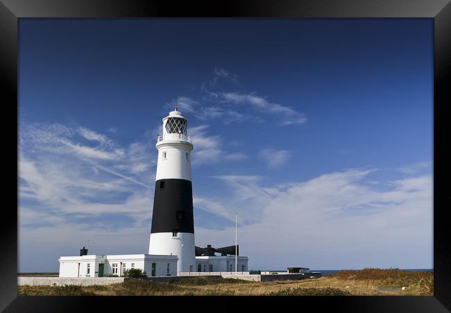 Alderney lighthouse Framed Print by Gary Eason