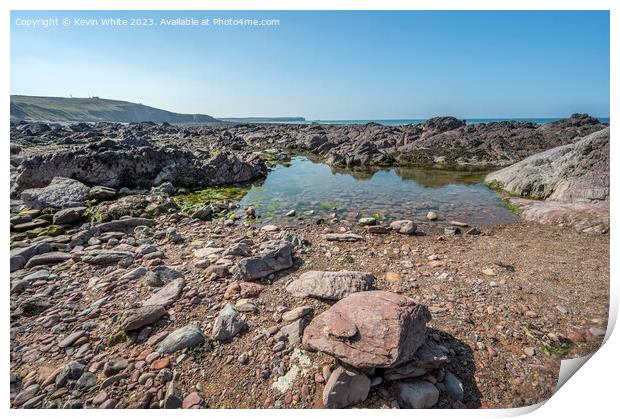 Calm rock pools on Freshwater West beach Pembrokeshire Print by Kevin White