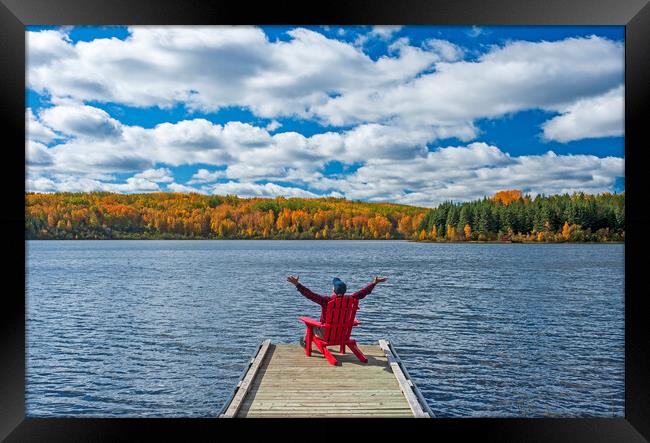 man in chair on dock Framed Print by Dave Reede