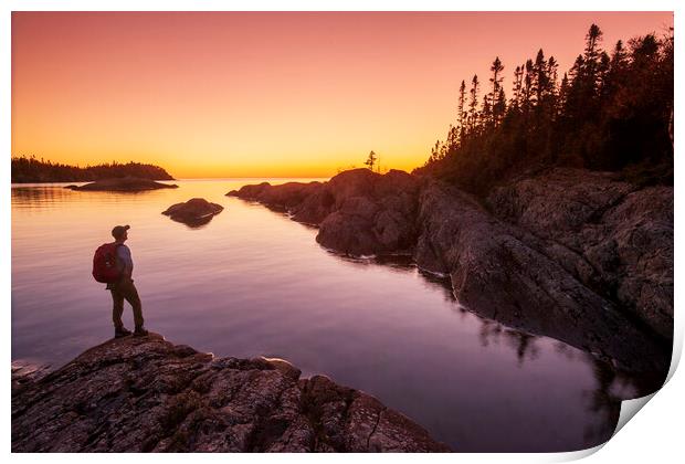 hiker along shoreline Print by Dave Reede