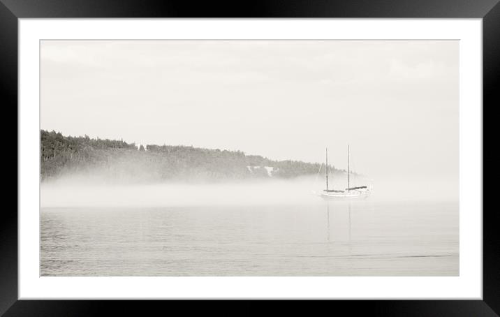 Misty Shore with Boat Framed Mounted Print by Kevin Howchin
