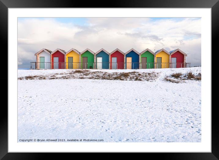 Blyth Beach Huts Snow Framed Mounted Print by Bryan Attewell