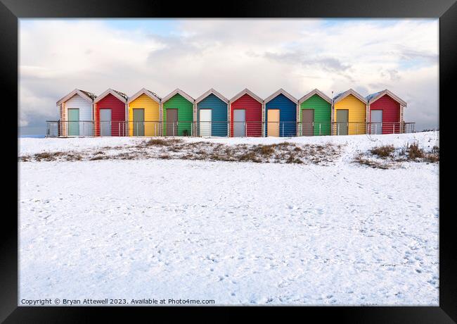 Blyth Beach Huts Snow Framed Print by Bryan Attewell