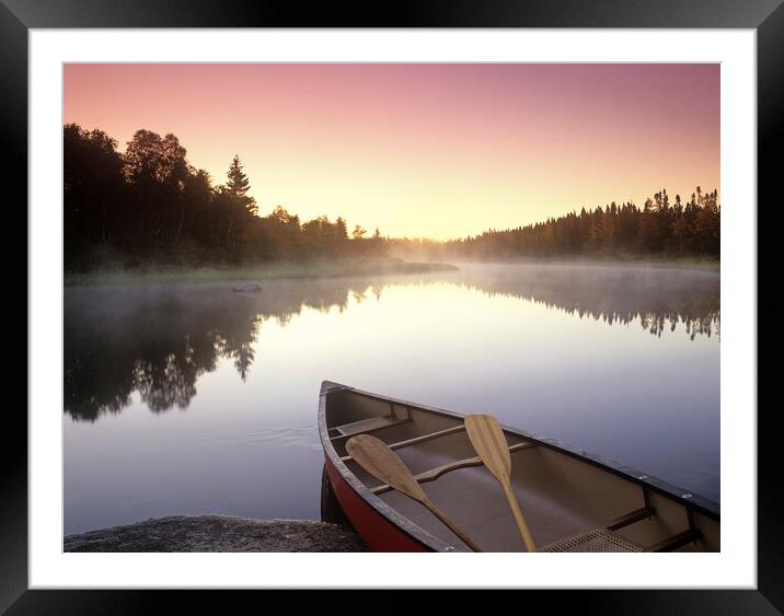 canoe along the Whiteshell River Framed Mounted Print by Dave Reede