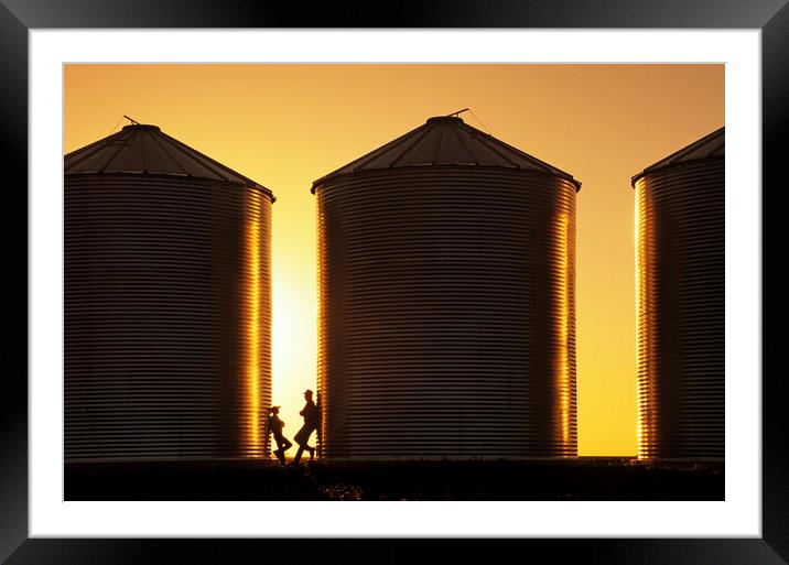 father and son next to grain bins Framed Mounted Print by Dave Reede