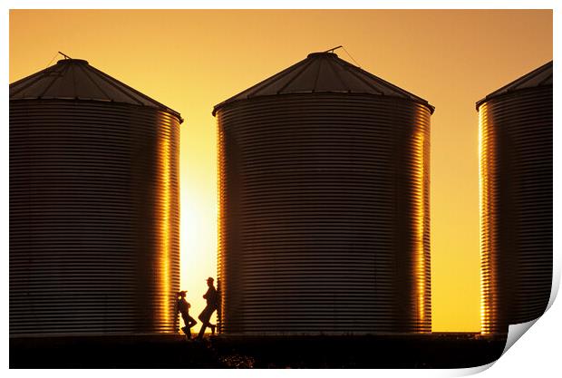 father and son next to grain bins Print by Dave Reede