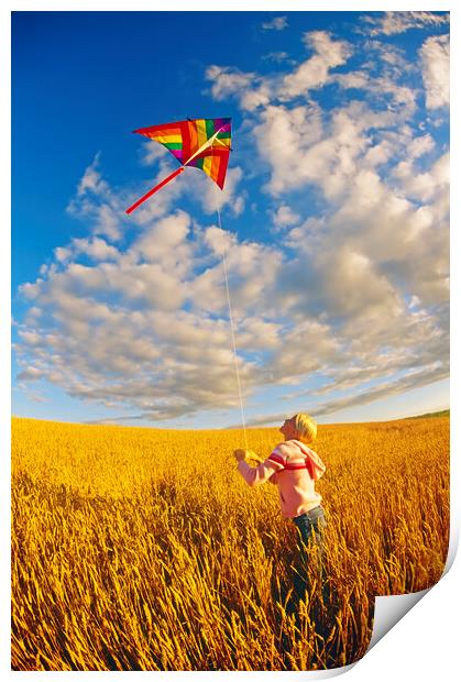girl flying a kite in spring wheat field  Print by Dave Reede