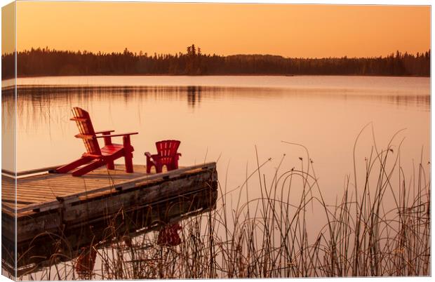 chairs on dock at Beautiful Lake Canvas Print by Dave Reede
