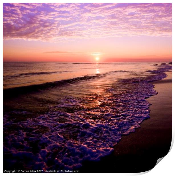 A sunset over a beach next to the ocean Print by James Allen