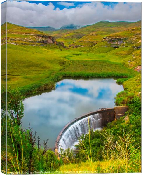 View over Langtoon Dam nestled in a valley in the Golden Gate Highlands National Park beneath the distant Maluti mountains, Free State, South Africa.  Canvas Print by Adrian Turnbull-Kemp