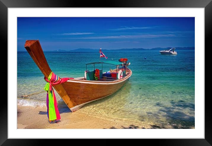 Long tail boat with power boat in the background on Koh Naka isl Framed Mounted Print by Kevin Hellon
