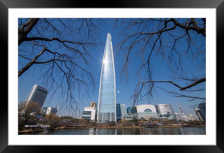 Landscape view fo Lotteworld tower Framed Mounted Print by Ambir Tolang